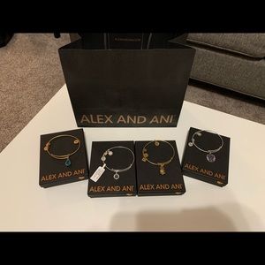 Four Alex and Ani bracelets